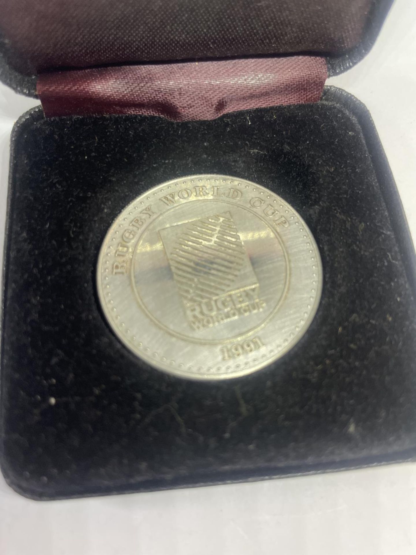 A SILVER 1991 RUGBY WORLD CUP MEDAL IN A PRESENTATION BOX - Image 3 of 4