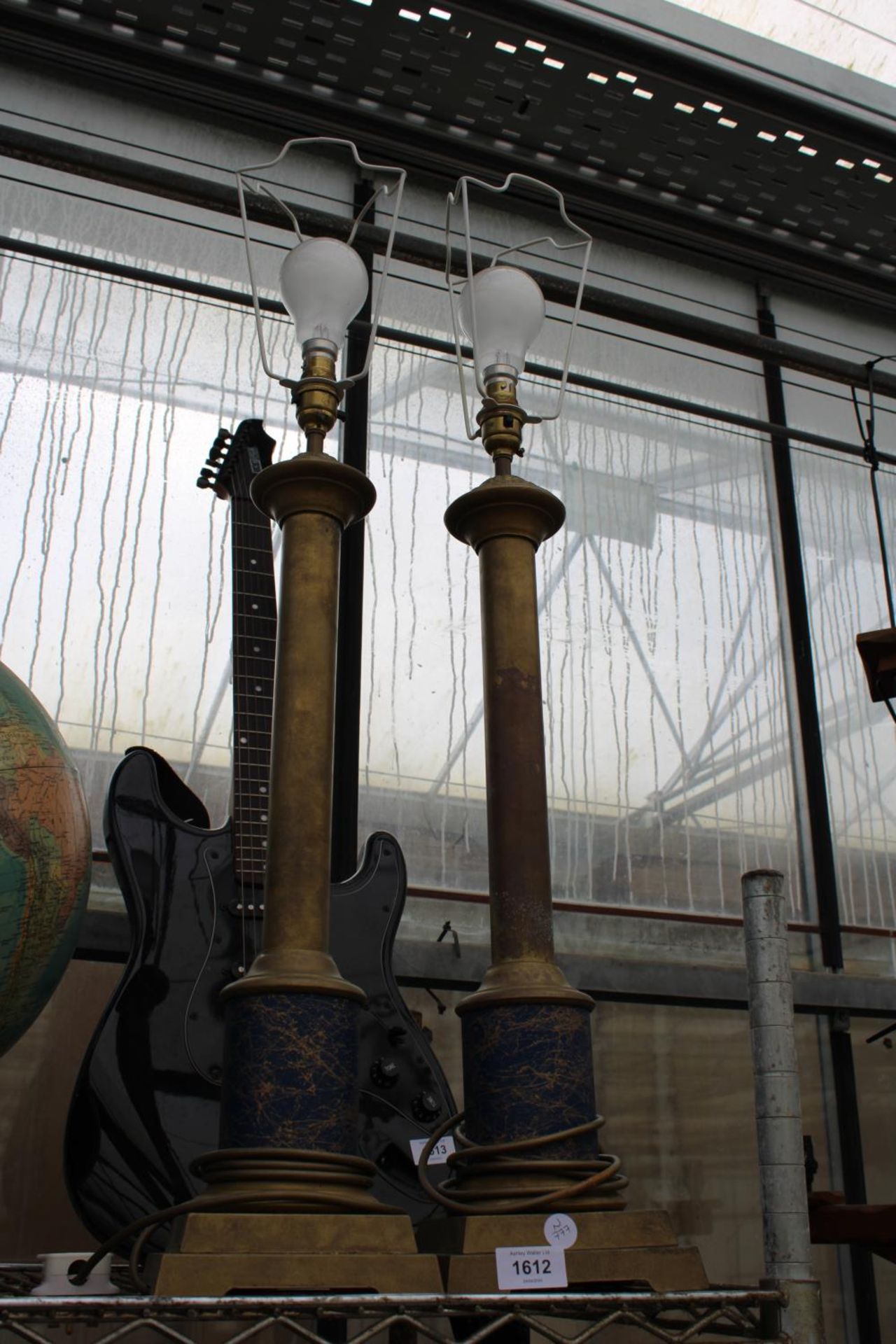 A PAIR OF TALL DECORATIVE BRASS TABLE LAMPS