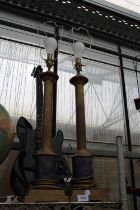 A PAIR OF TALL DECORATIVE BRASS TABLE LAMPS