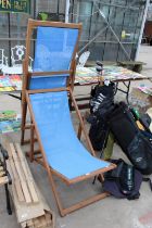 A PAIR OF RETRO WOODEN FOLDING DECK CHAIRS