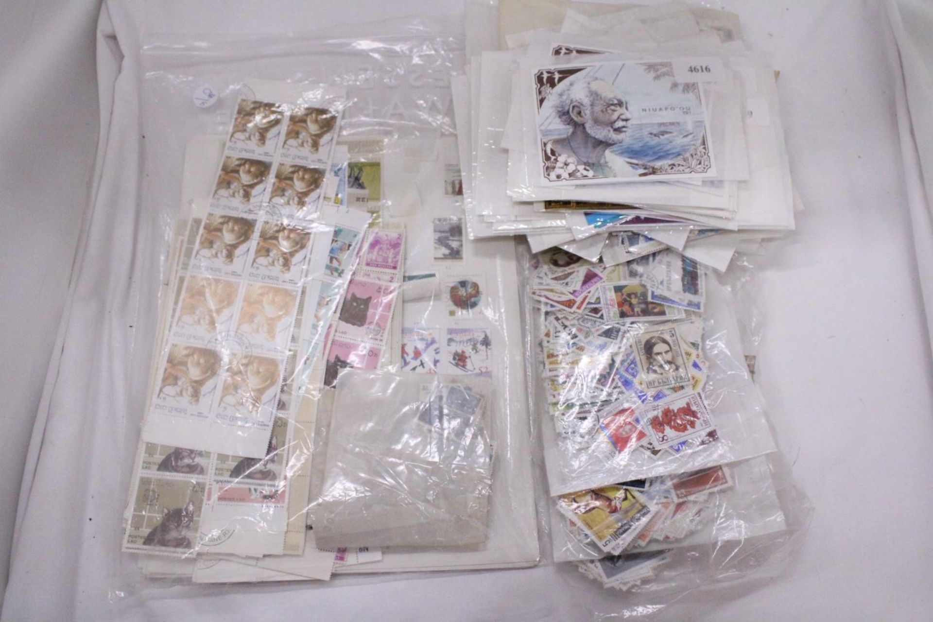 A LARGE BAG OF STAMPS IN PACKETS