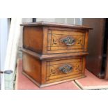 A VINTAGE MINIATURE OAK CHEST OF TWO DRAWERS WITH BRASS HANDLES