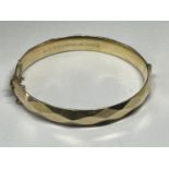 A GOLD PLATED BANGLE