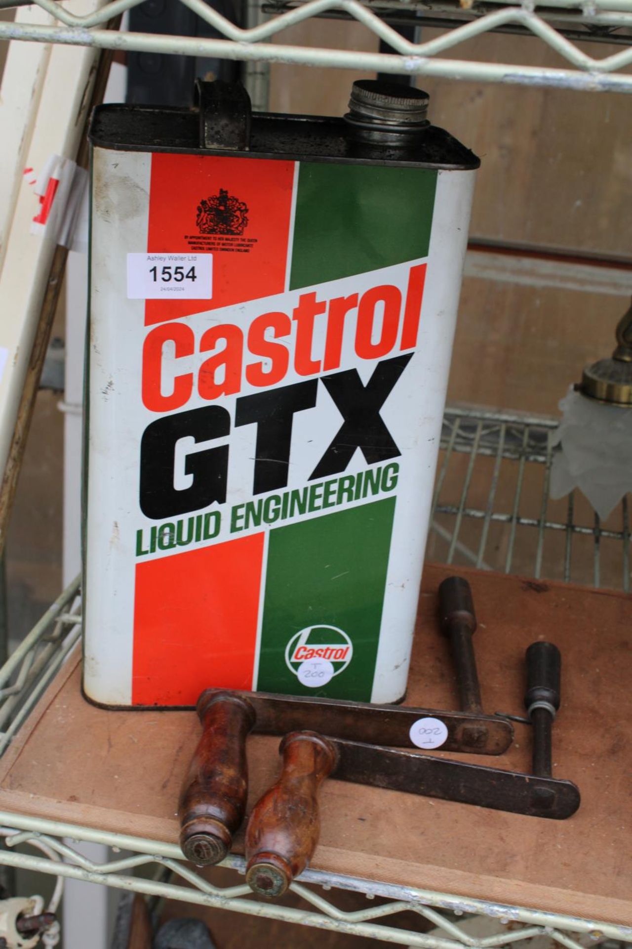 A VINTAGE CASTROL OIL CAN AND TWO TABLE WINDERS