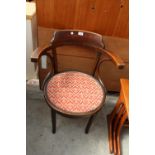 A LOW BENTWOOD ELBOW CHAIR