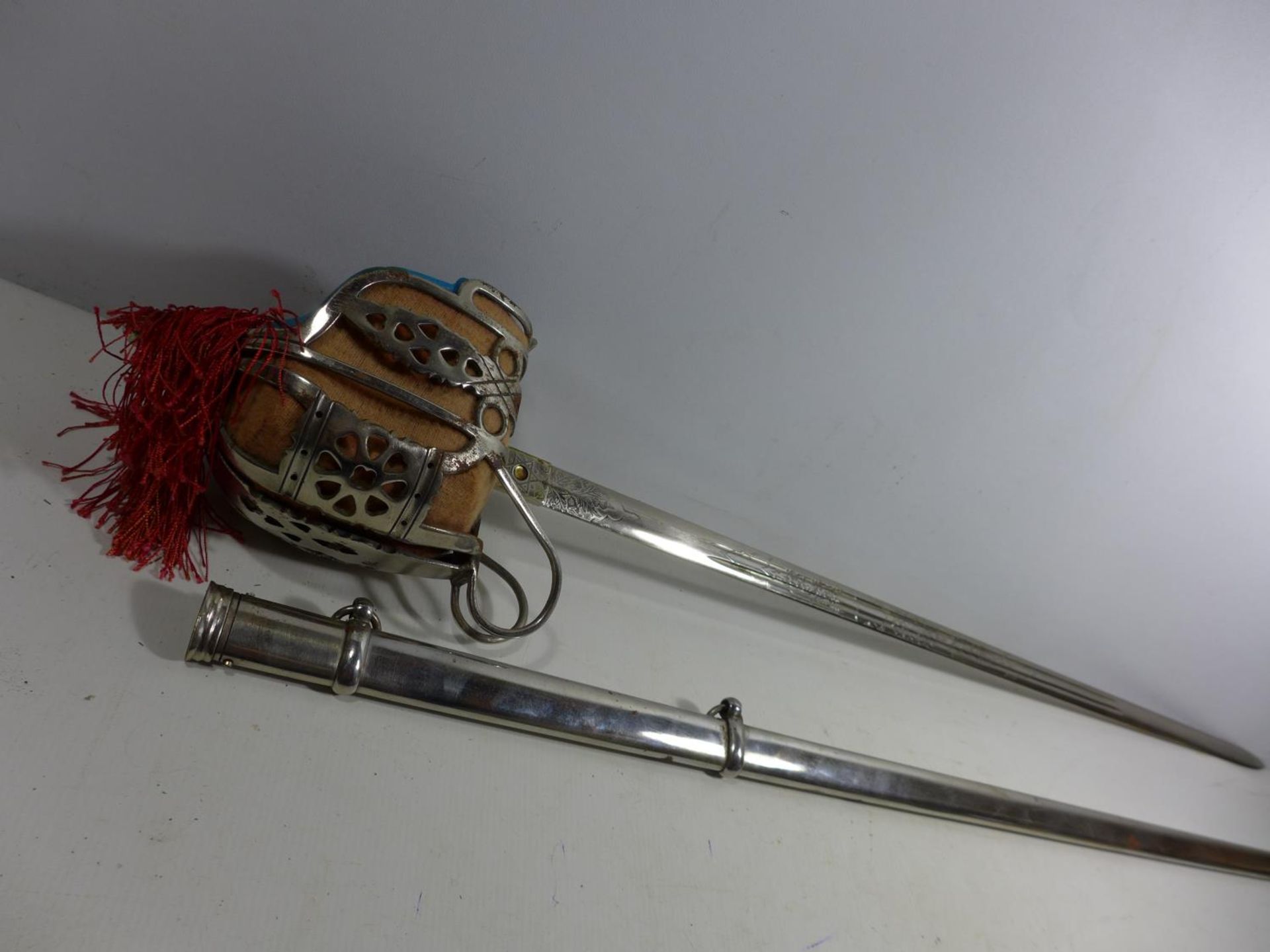 A REPLICA OF A VICTORIAN 1857 PATTERN SCOTTISH BASKET HILTED SWORD AND SCABBARD, 79CM BLADE, - Image 6 of 9