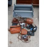 A HARD SHELL CARRY CASE AND AN ASSORTMENT OF CAMERAS