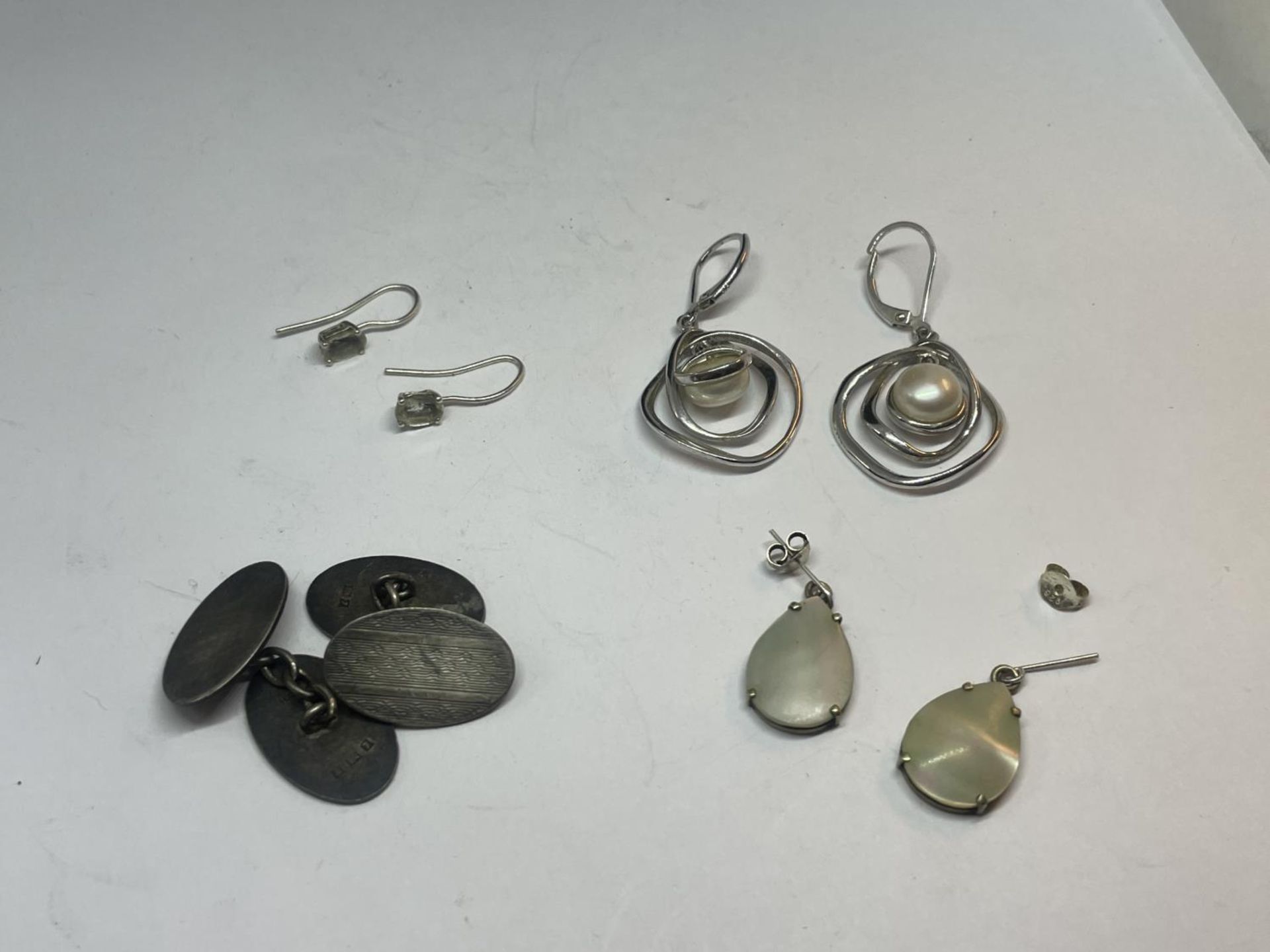 A QUANTITY OF EARRINGS AND CUFFLINKS