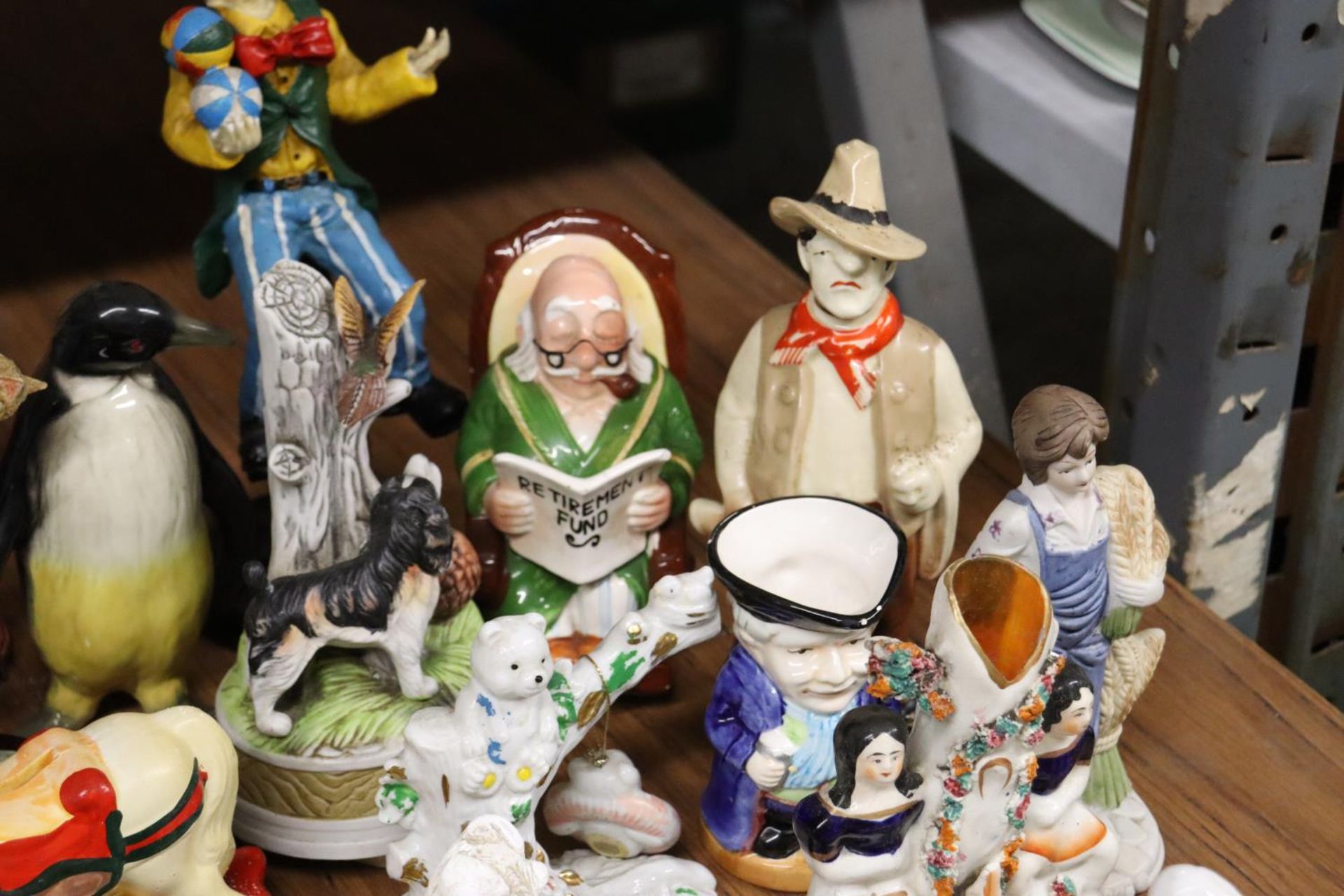 A COLLECTION OF FIGURES TO INCLUDE DOGS, RABBITS, A PENGUIN, STAFFORDSHIRE STYLE, CLOWNS, ETC - Image 6 of 7