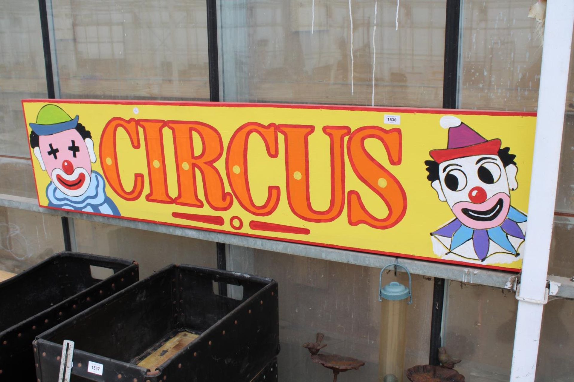 A WOODEN HAND PAINTED 'CIRCUS' SIGN