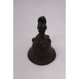 A ORIENTAL BRONZE BELL DEPICTING A HUNTING SCENE AROUND BASE OF BELL