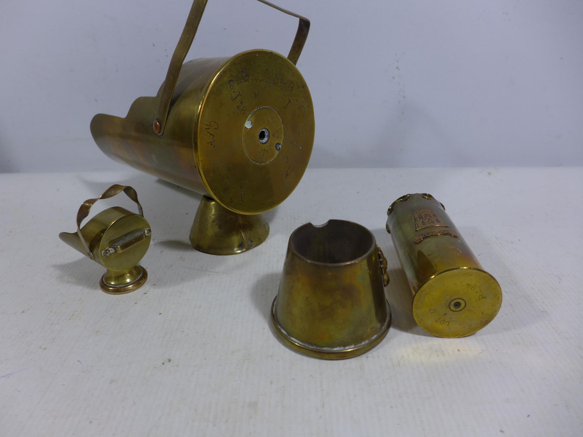FOUR BRASS WORLD WAR I TRENCH ART ITEMS, TO INCLUDE TWO HELMET SHAPED MINIATURE COAL BUCKETS - Image 2 of 5