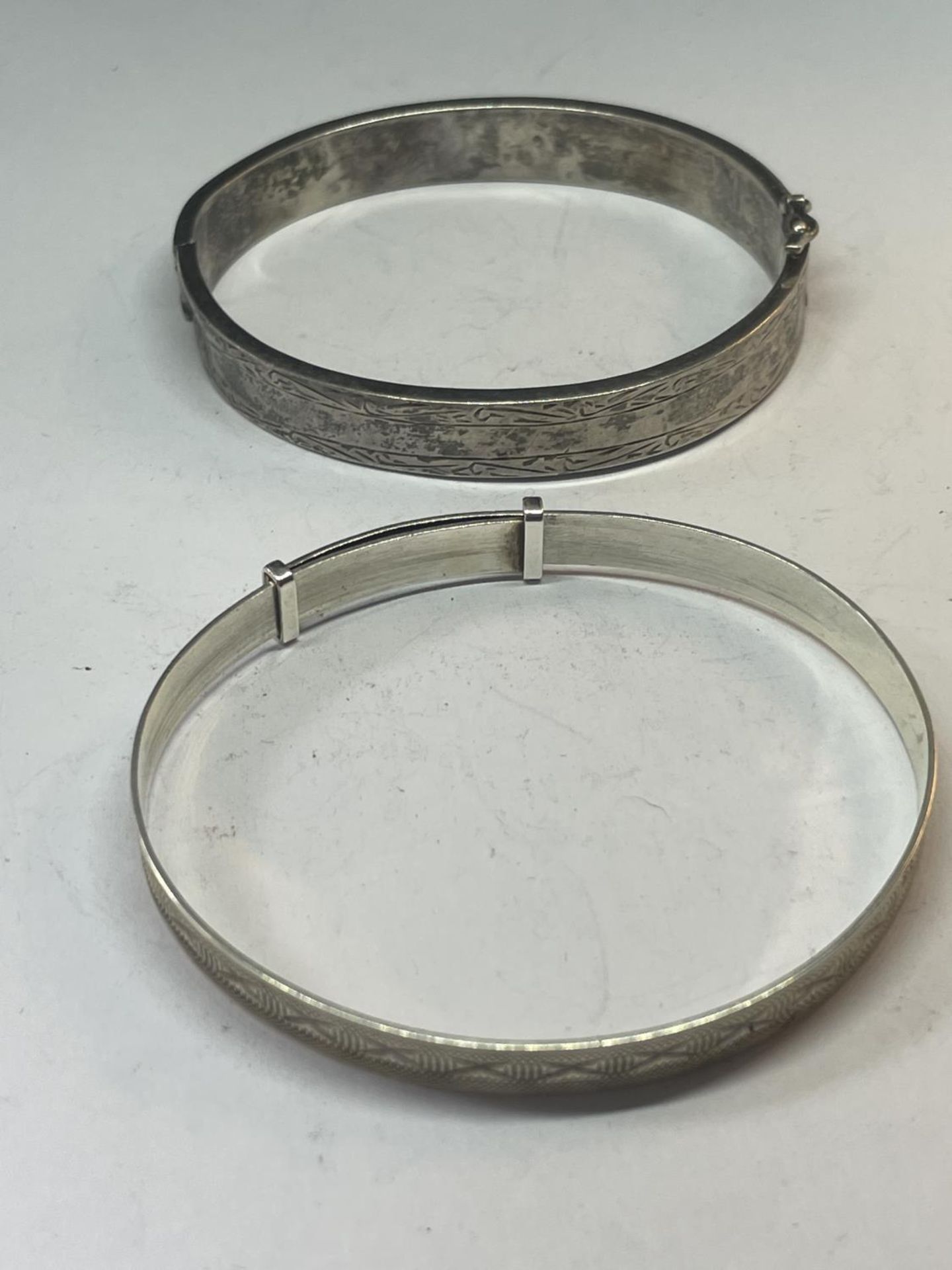 TWO SILVER BANGLES