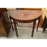 A 19TH CENTURY STYLE MAHOGANY DEMI-LUNE HALL TABLE, 35" WIDE