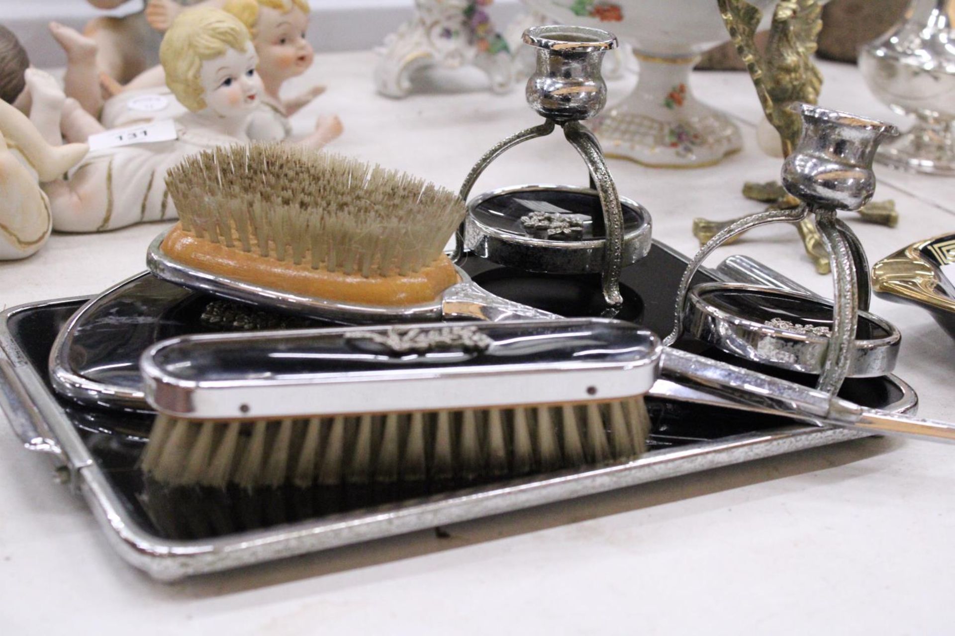 A VINTAGE BLACK DRESSING TABLE VANITY SET TO INCLUDE A HAND MIRROR, TWO BRUSHES AND TRAY - PLUS - Image 5 of 5