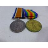 A WORLD WAR I MEDAL PAIR AWARDED TO T4 142919 DRIVER B LAWN ARMY SERVICES CORPS