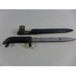 A RUSSIAN/EAST GERMAN AK47 BAYONET AND SCABBARD, 20CM BLADE, LENGTH 33CM