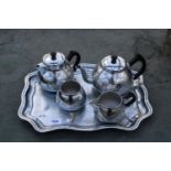 A METALWARE TRAY AND A TEA SERVICE COMPRISING OF TWO TEAPOTS, SUGAR BOWL AND JUG