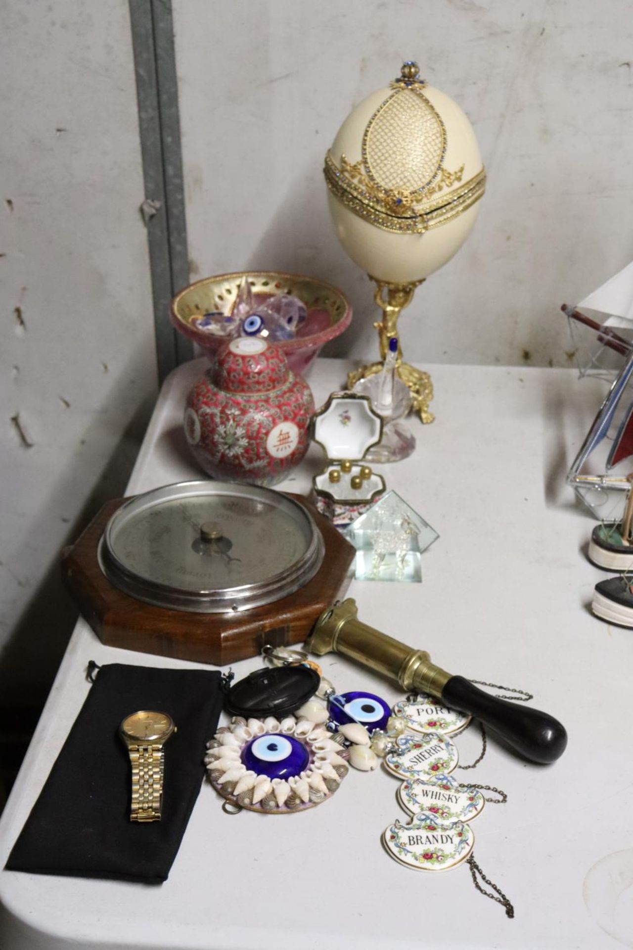 A MIXED LOT TO INCLUDE A FABERGE STYLE EGG, CHINESE GINGER JAR, BAROMETER, COALPORT DECANTER LABELS,