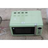 A GREEN SWAN MICROWAVE OVEN