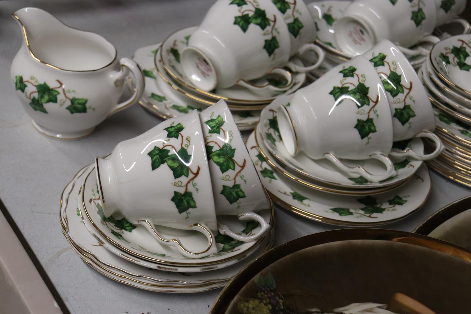 A COLCLOUGH 'IVY LEAF' PART TEASET TO INCLUDE CAKE PLATES, A CREAM JUG, CUPS, SAUCERS AND SIDE - Image 6 of 6