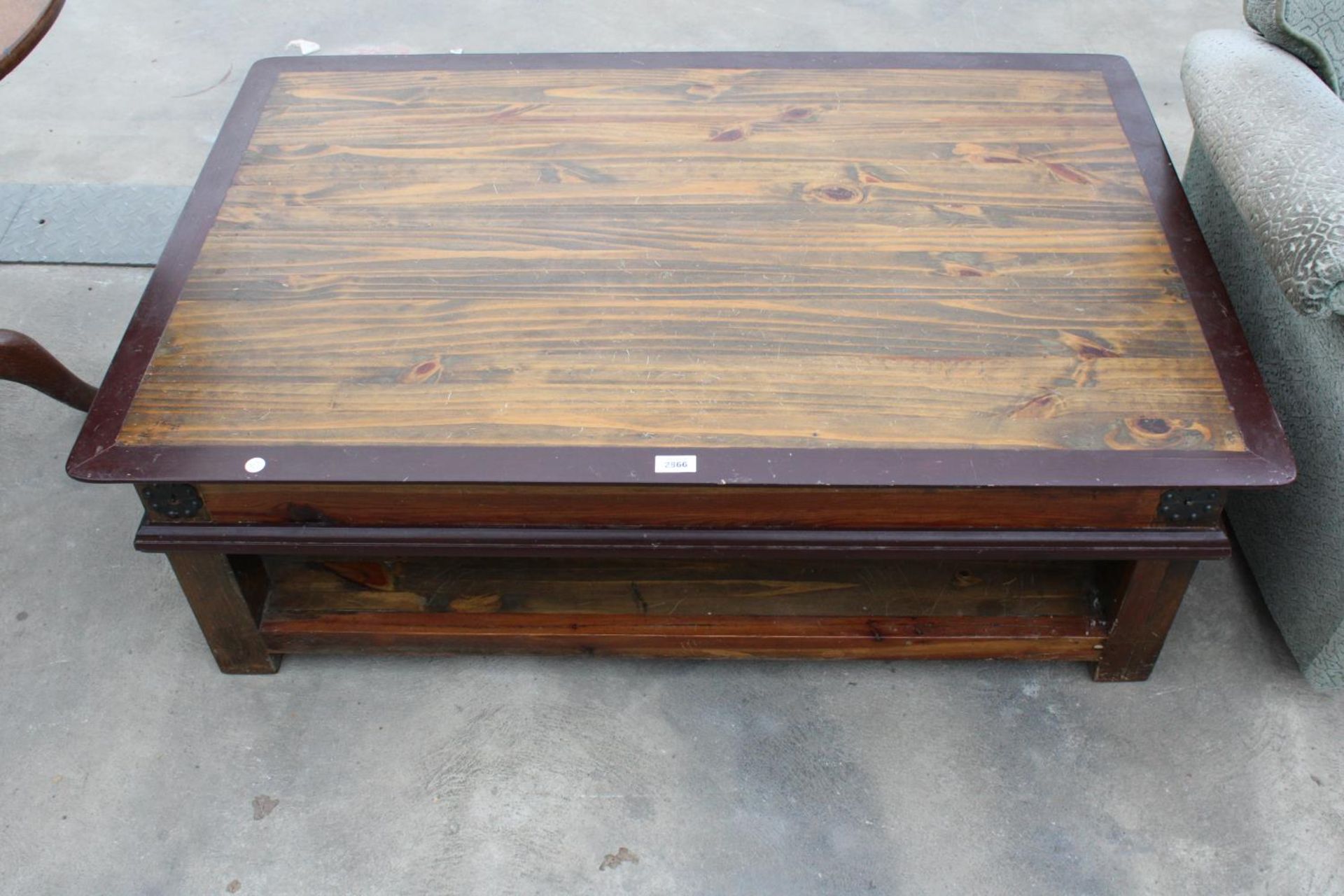 A MODERN PINE TWO TIER COFFEE TABLE 47" X 31"