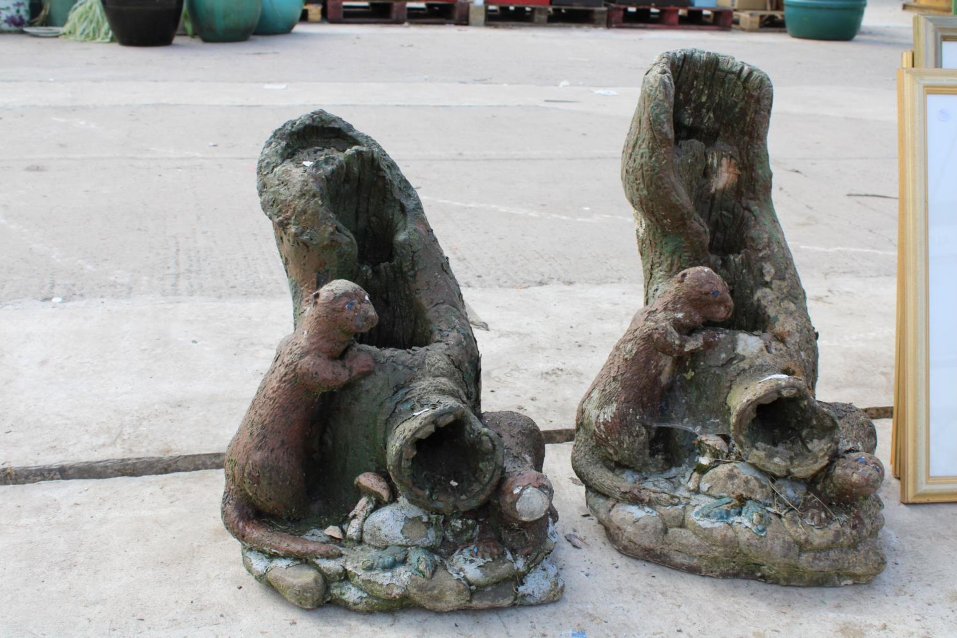 TWO CONCRETE OTTER WATER FEATURES