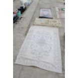 THREE VARIOUS SIZED PINK PATTERNED RUGS