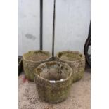 A SET OF THREE MATCHING RECONSTITUTED STONE GARDEN POTS