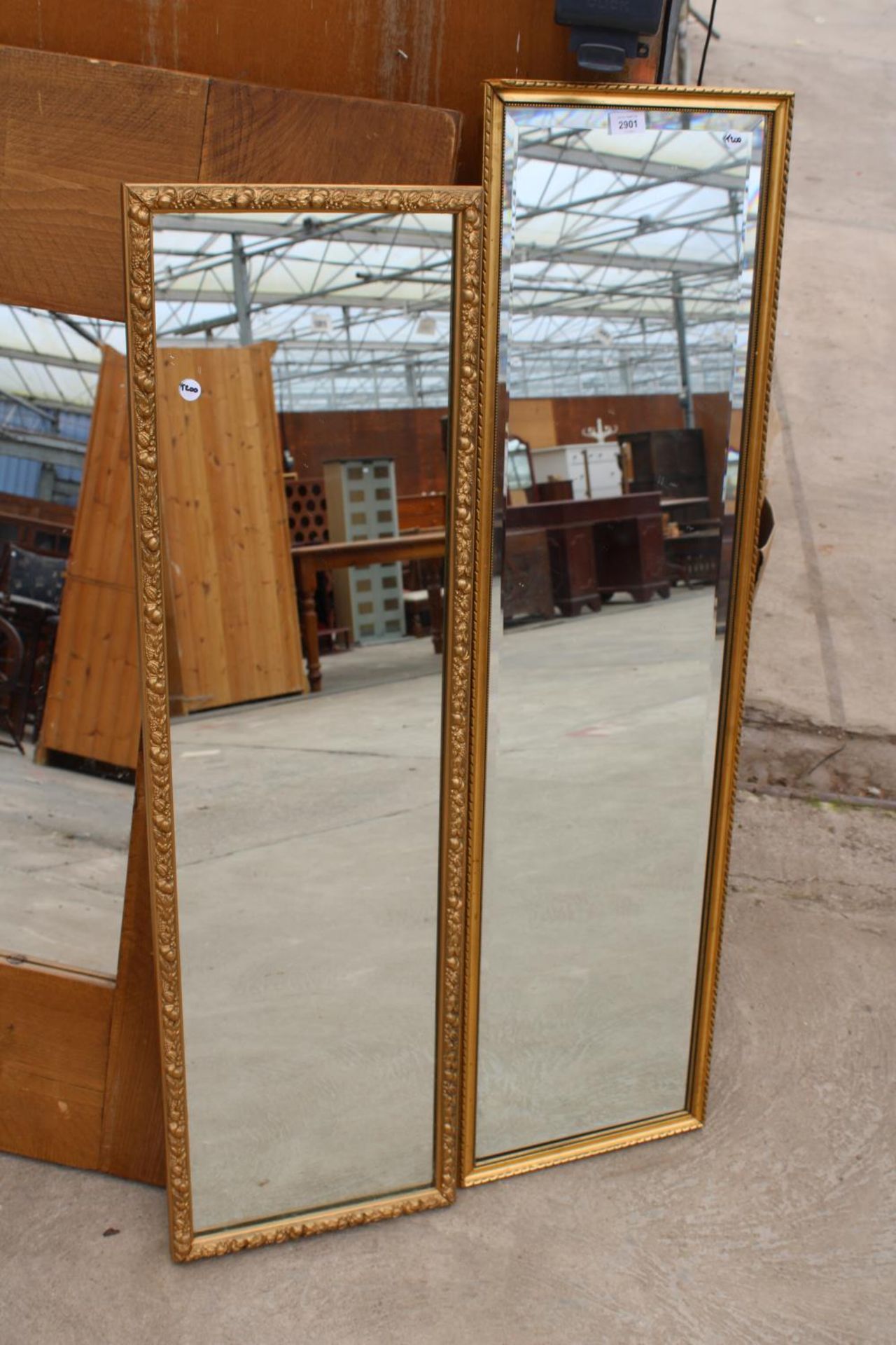 TWO MODERN GILT FRAMED WALL MIRRORS