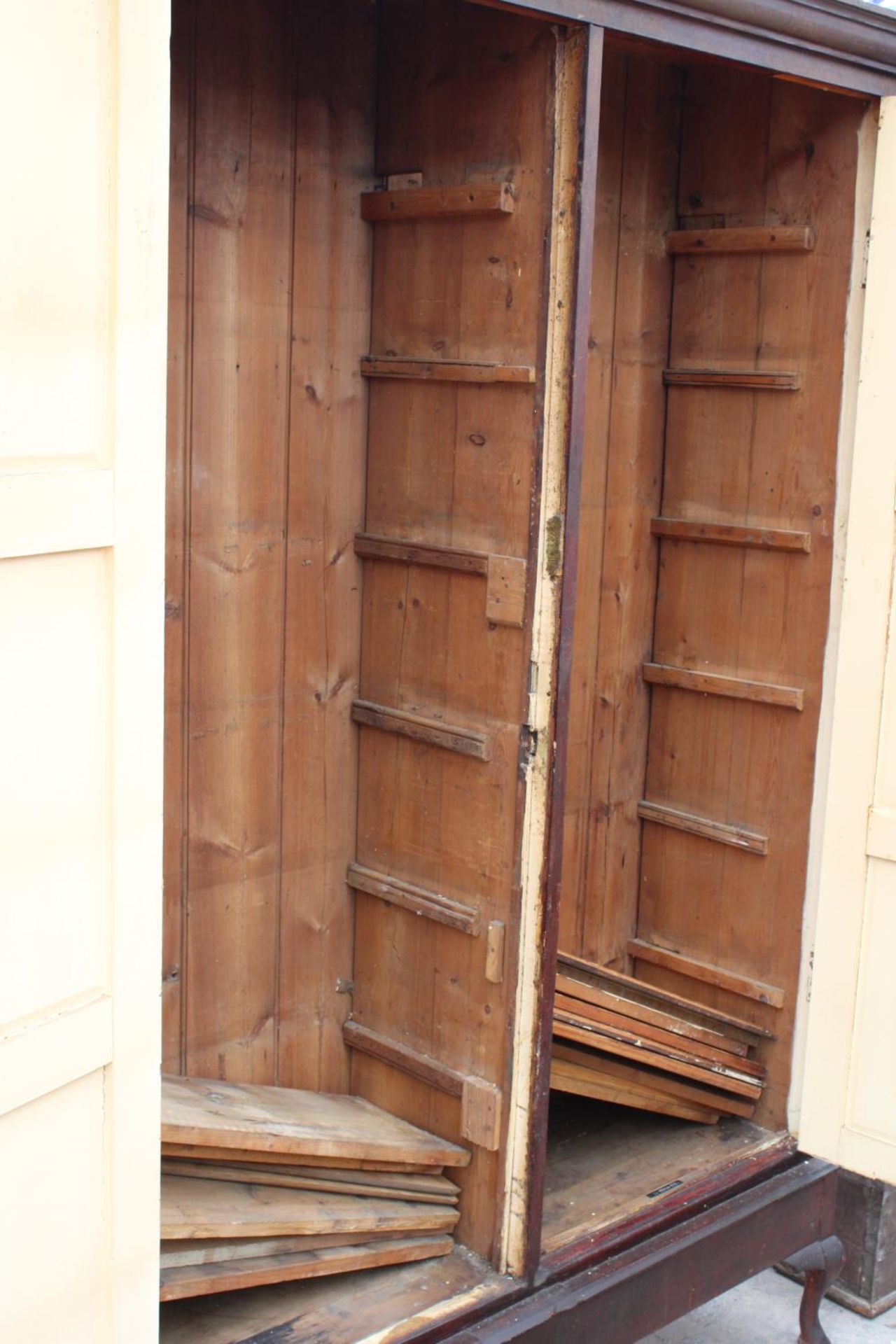 A VICTORIAN PINE PANELLED TWO DOOR STORAGE CUPBOARD ON CABRIOLE LEGS, 59" WIDE, 18.5" DEEP AND 85.5" - Image 5 of 5