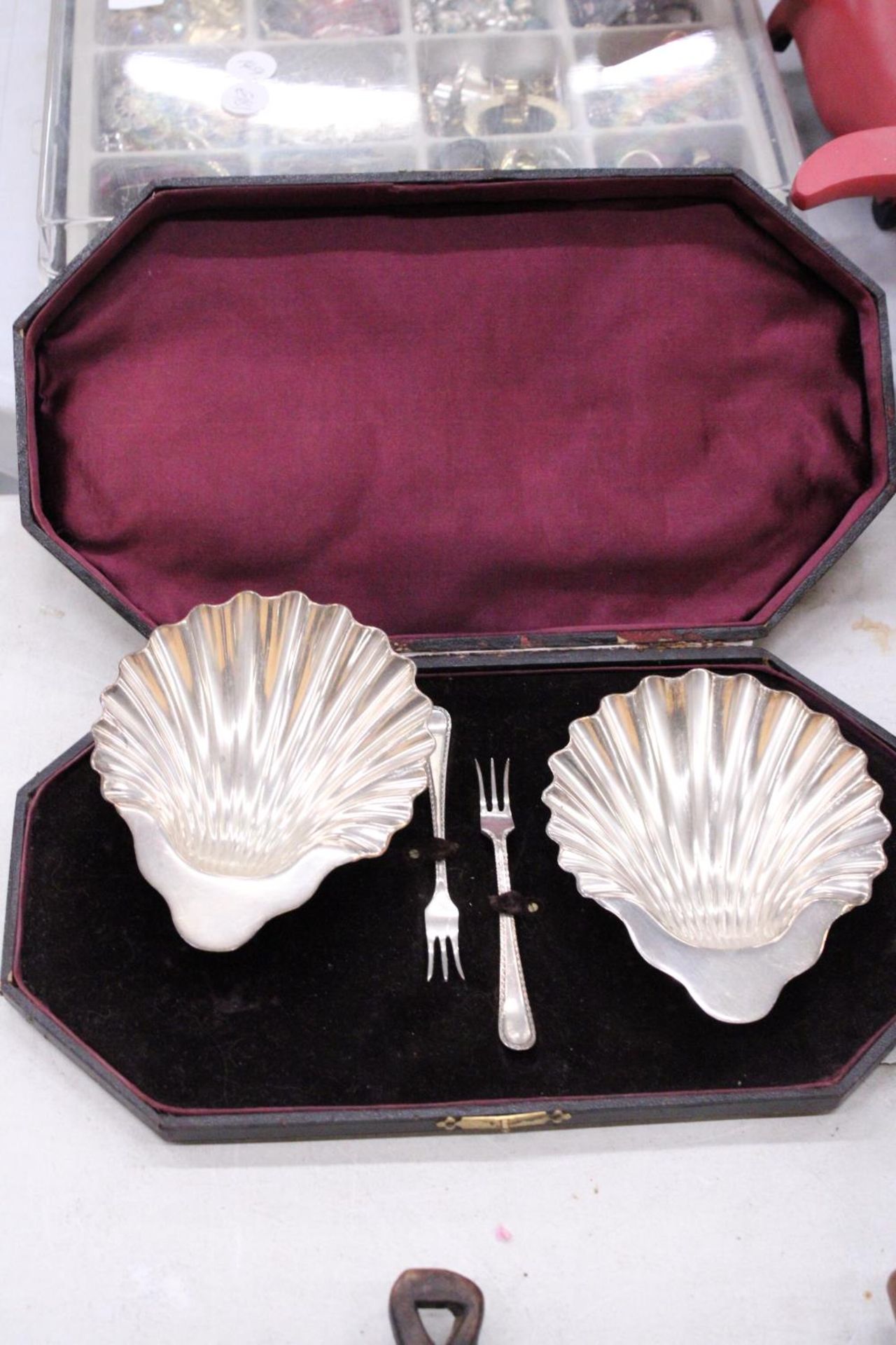 A BOXED SILVER PLATED "SHELLS AND FORK" OYSTER SET