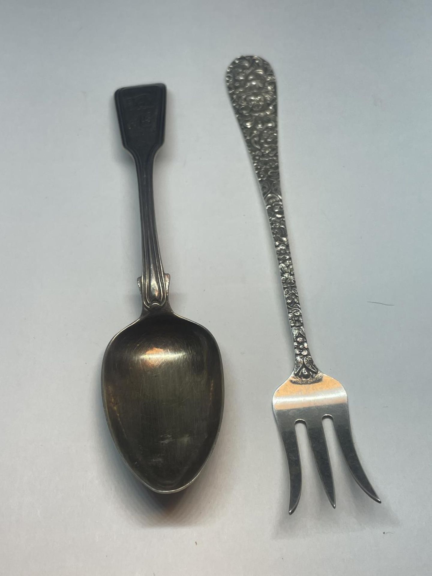 A SILVER FORK AND SILVER SPOON