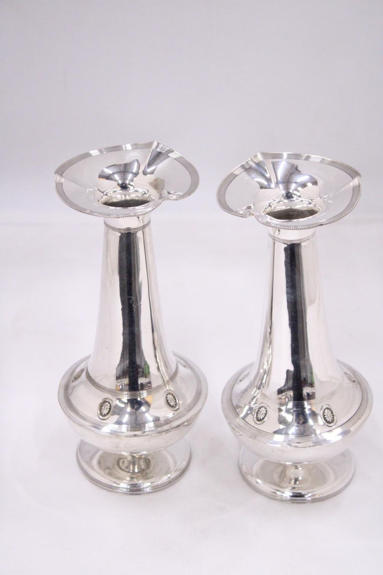 A PAIR OF VINTAGE SILVER PLATED "BUD" VASES