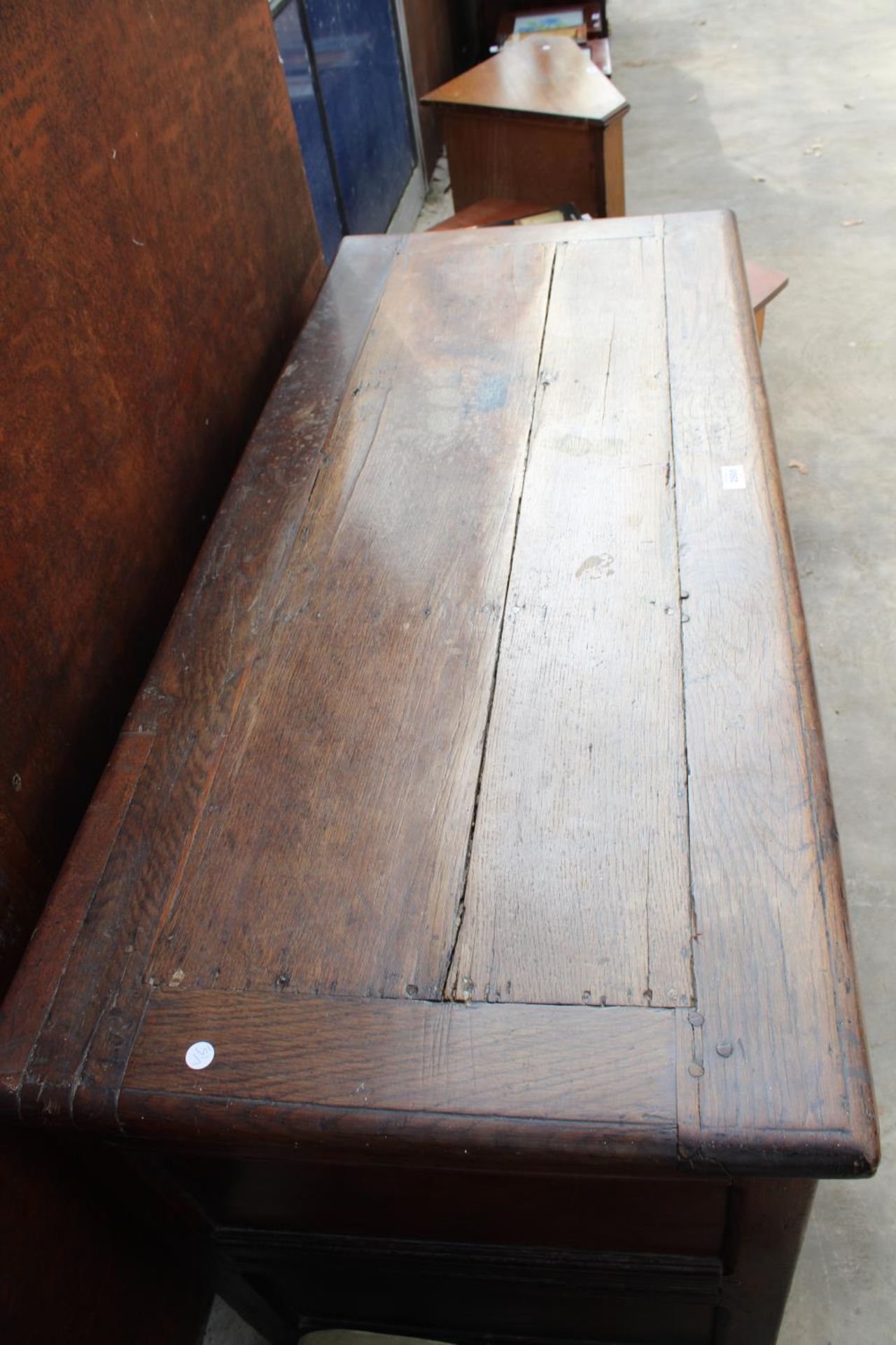 A GEORGE III OAK BLANKET CHEST WITH CARVED FRIEZE AND 4 SHAM DRAWERS, 52" WIDE - Image 5 of 5