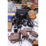 A COLLECTION OF CAMERAS TO INCLUDE A CANON EOS WITH BATTERY PACK, LENS AND BAG, PLUS A VINTAGE