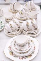 A QUANTITY OF CHINA TEAWARE TO INCLUDE ROYAL STANDARD AND COLCLOUGH - CUPS, SAUCERS, SIDE PLATES,