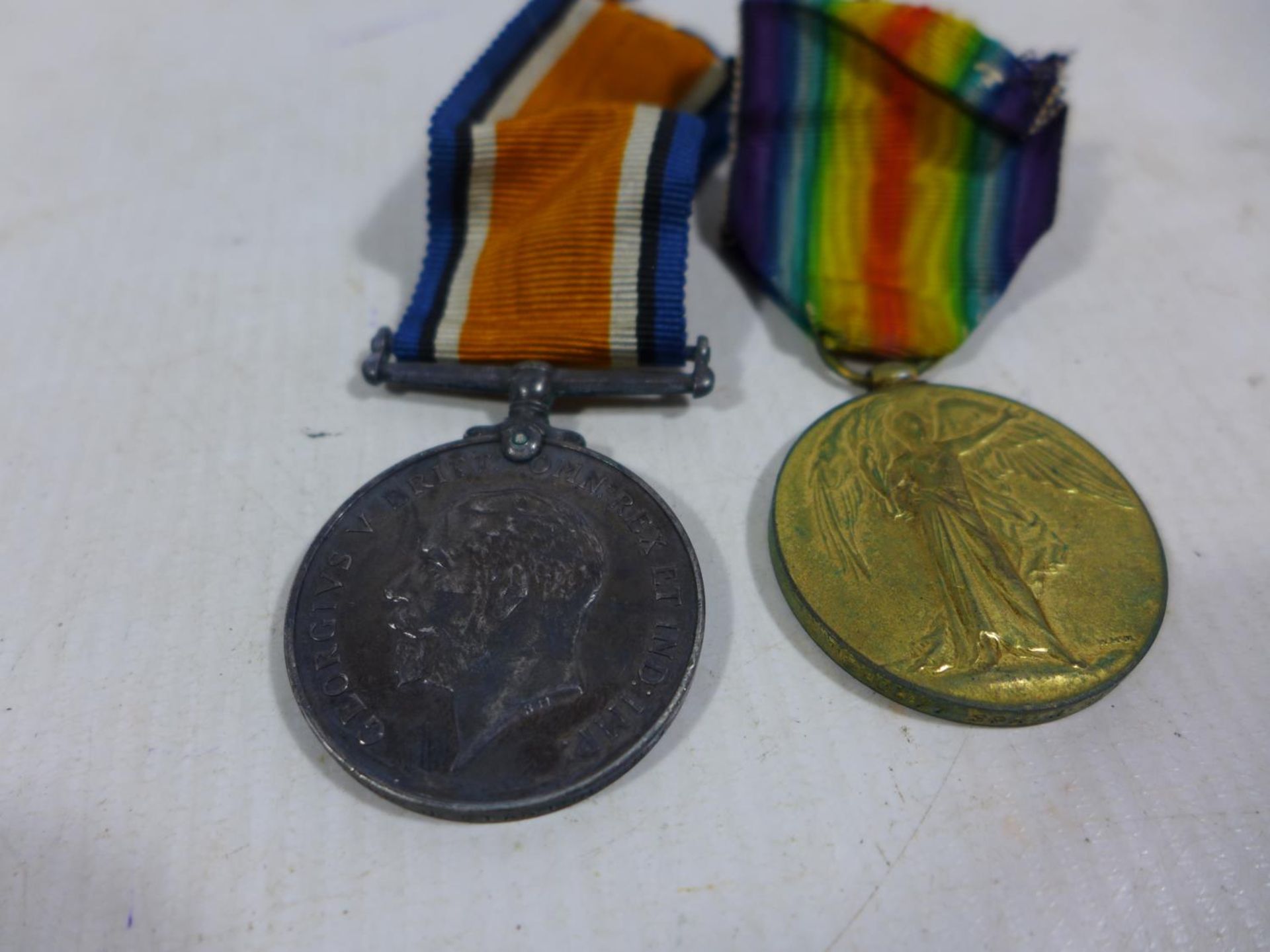 A WORLD WAR I MEDAL PAIR AWARDED TO 290477 SAPPER J STANTON ROYAL ENGINEERS