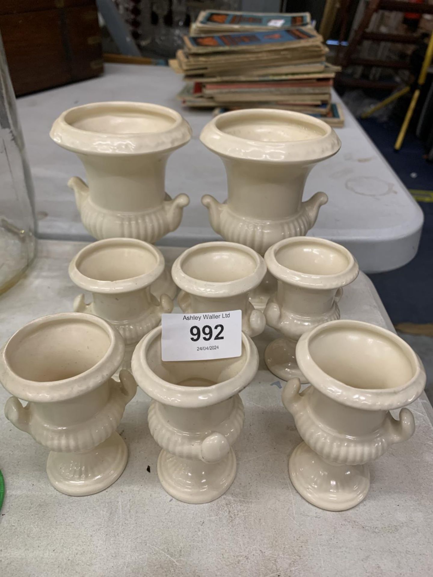 EIGHT DARTMOUTH POTTERY URNS TO INCLUDE TWO MEDIUM AND SIX SMALL