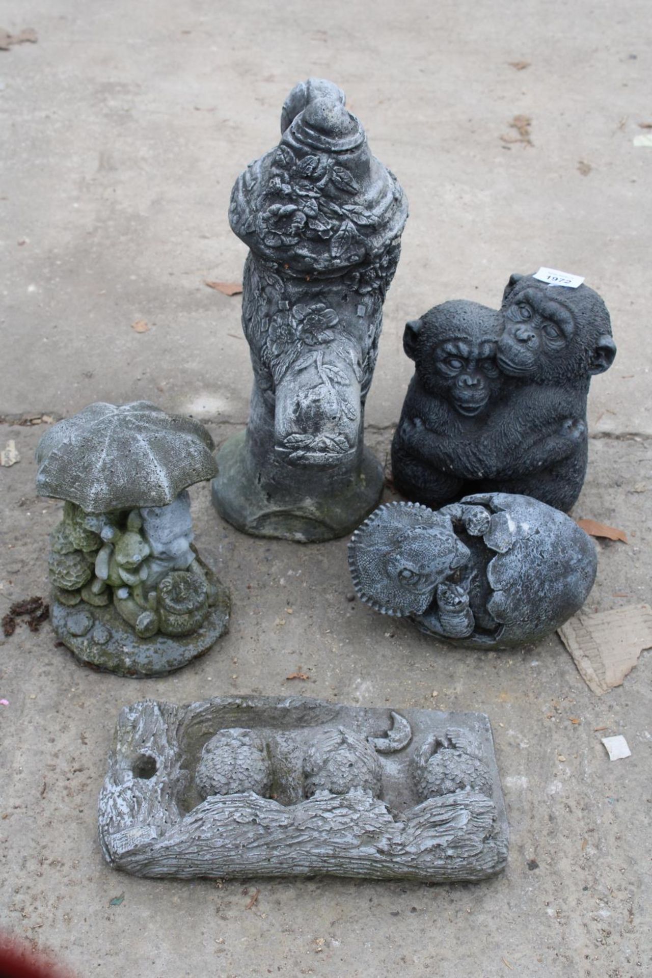 FIVE CONCRETE GARDEN FIGURES TO INCLUDE A WATERPUMP AND MONKIES ETC