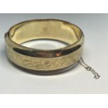 A GOLD PLATED BANGLE