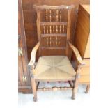 AN 18TH CENTURY STYLE ELM SPINDLE-BACK CARVER CHAIR WITH RUSH SEAT