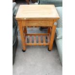 A MODERN KITCHEN WORK TABLE ON CASTERS WITH WOODBLOCK TOP WITH SINGLE DRAWER AND PULL-OUT SLIDE, 26"
