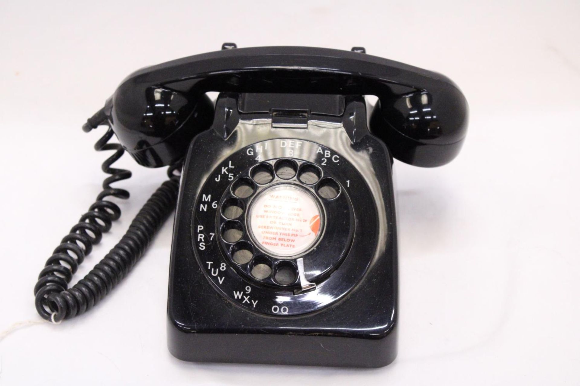 A VINTAGE BLACK TELEPHONE WITH DIAL - Image 2 of 6