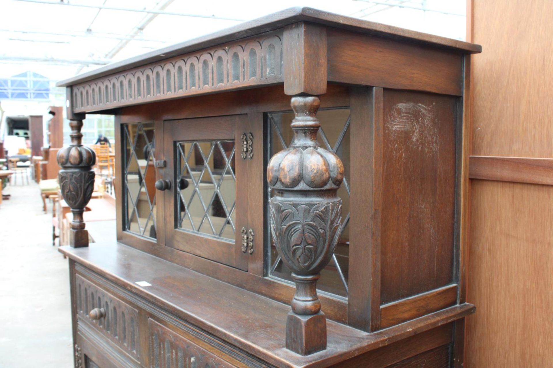 AN OAK JACOBEAN STYLE COURT CUPBOARD WITH GLAZED AND LEADED UPPER PORTION, 54" WIDE - Image 2 of 6