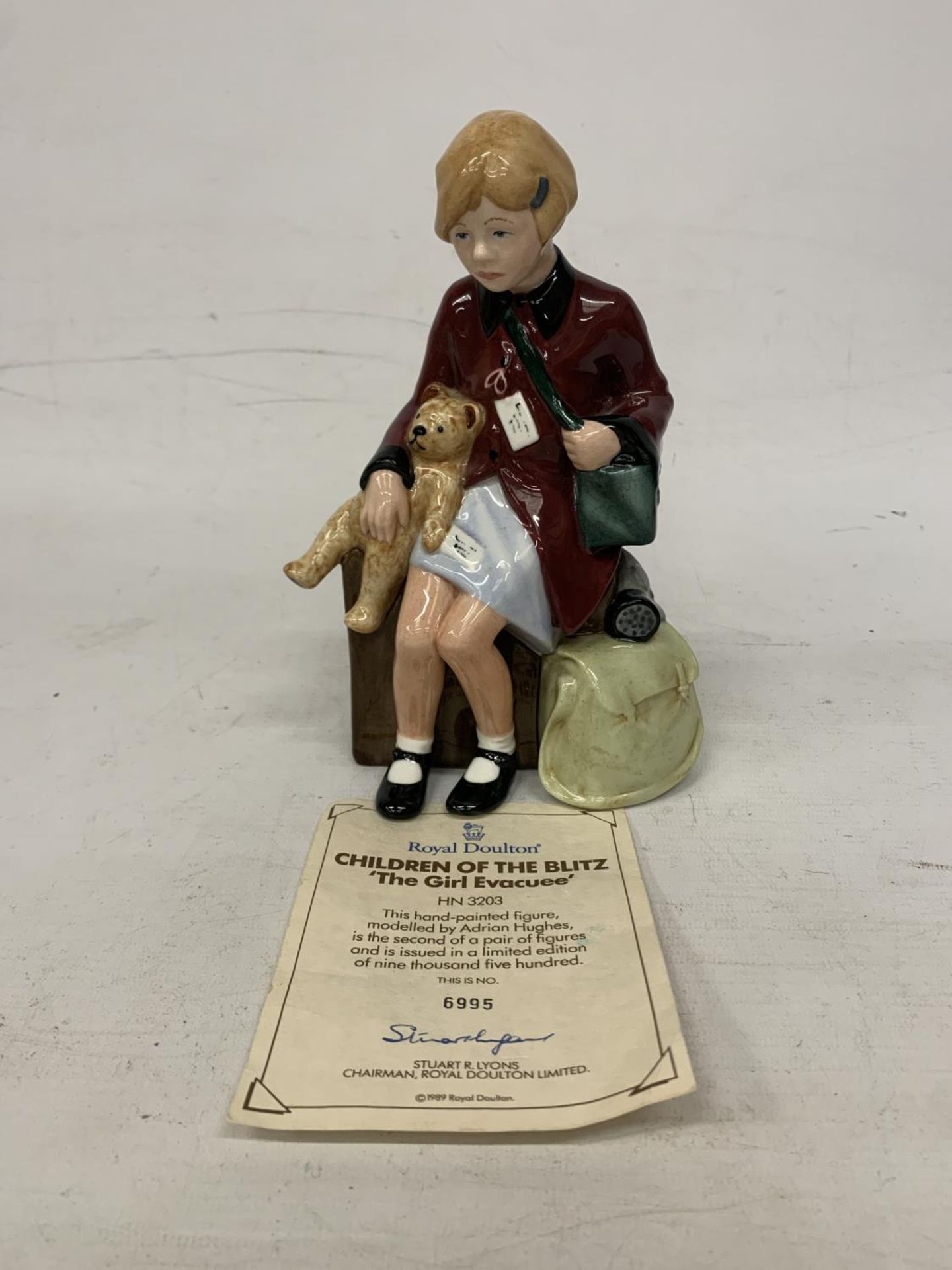 A ROYAL DOULTON FIGURE WITH CERTIFICATE "CHILDREN OF THE BLITZ - THE GIRL EVACUEE" HN 3203 LIMITED
