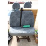 A TWO SEATER VAN SEAT