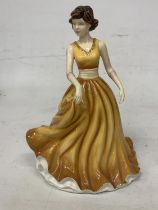 A BOXED ROYAL DOULTON FIGURE FROM THE PRETTY LADIES COLLECTION "KAREN"