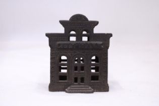 A UNUSUAL HEAVY CAST IRON "CITY BANK" MONEY BOX