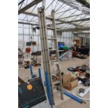 A 24 RUNG THREE SECTION EXTENDABLE ALUMINIUM LADDER